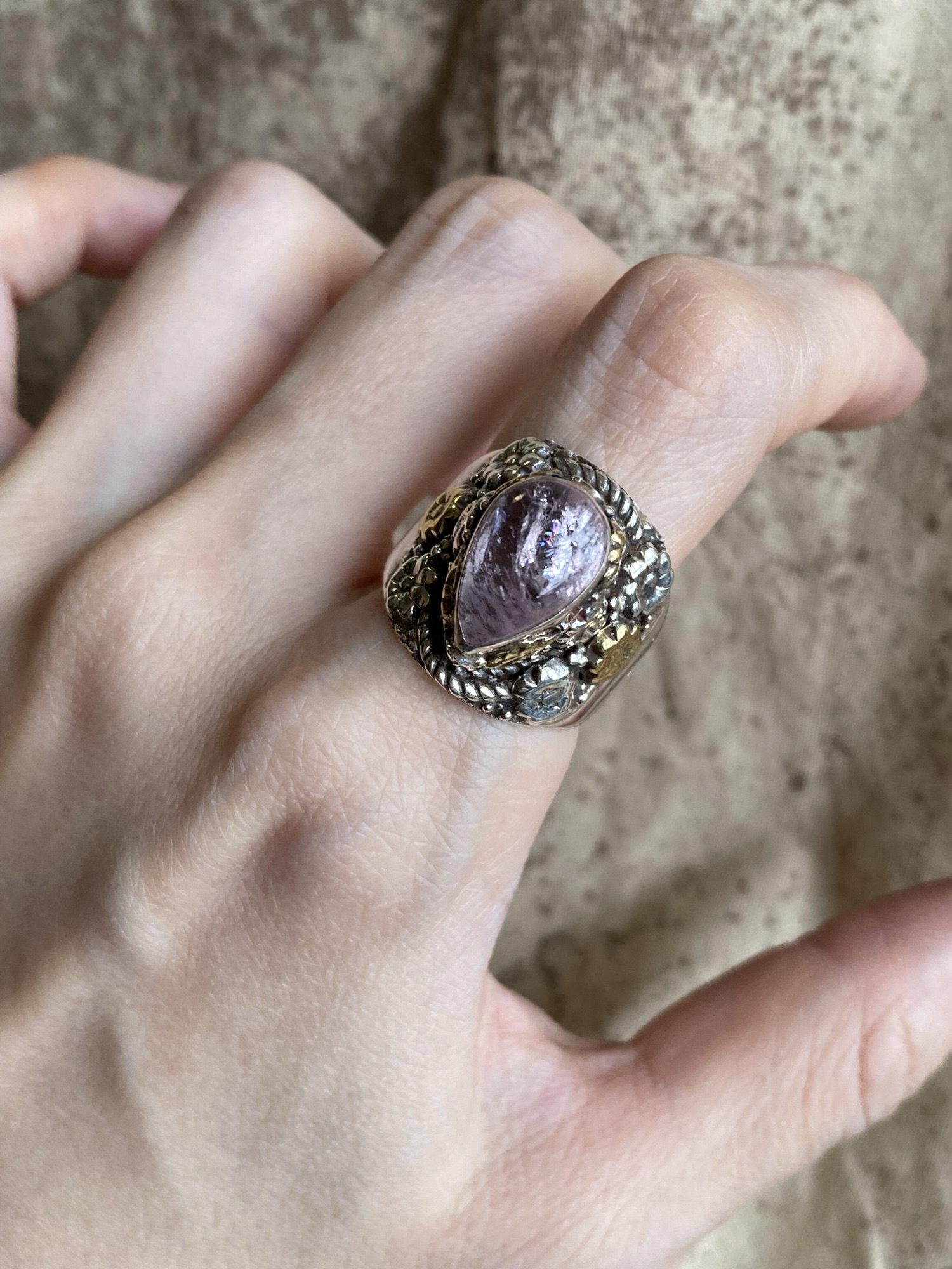 Kunzite (inclusions and cracks present)